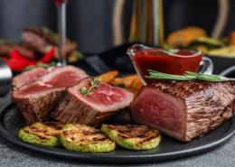 sliced beef tenderloin on a plate