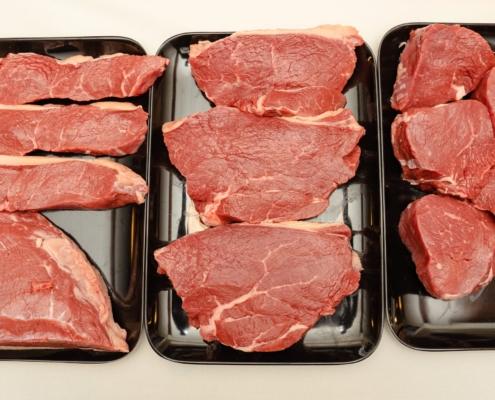 trays of grain-fed raw beef